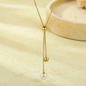 Adjustable golden stainless steel necklace with sliding beads and a white pearl pendant