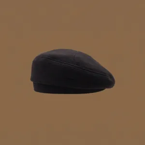 Detailed view of black cotton twill beret with firm texture and minimalist design