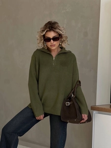 Women's dark green half-zip knit sweater with loose fit and casual minimalist style