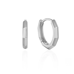 Macro detail of S925 sterling silver geometric hoop earrings with polished facets and stamp