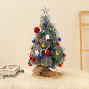60cm silver artificial Christmas tree with LED lights and festive ornaments on burlap base