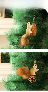 Close-up of plush squirrel ornament with natural pinecone and berries on Christmas tree