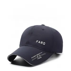 Close-up of quick-dry navy baseball cap showing white 3D FARD lettering and silver brim