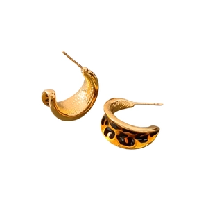 Vintage gold-plated C-shaped hoop earrings with leopard print enamel detail