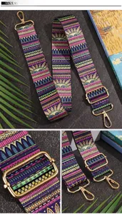 Close-up of bohemian floral webbing strap with adjustable gold metal hardware and stitching