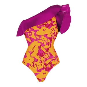 Detail of ruffle shoulder and tropical floral print on one-piece swimsuit