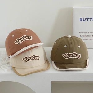 Baby soft-brim baseball caps with YouCan patch in caramel, beige, and olive green colors