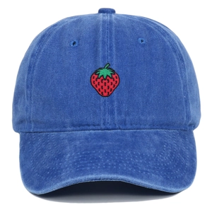 Close-up of strawberry embroidery detail on washed cotton denim baseball cap