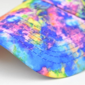 Detail of colorful tie-dye visor brim with reinforced six-row stitching for sun hat