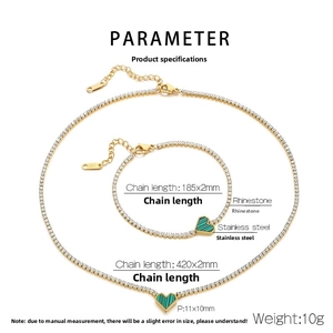 Macro view of gold stainless steel heart jewelry set with green malachite stone texture