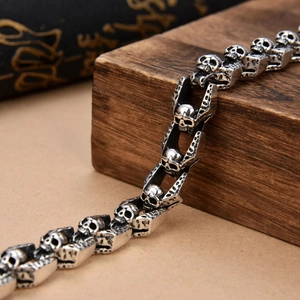 Vintage gothic skull bracelet in silver stainless steel for men with a retro metal finish