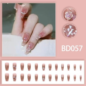 Nude pink gradient coffin nails with 3D camellia flowers and pearl rhinestones