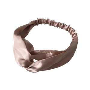 Champagne satin knot headband with elastic band design for women on white background
