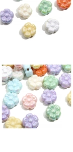 Close-up of 19mm pearlized acrylic flower beads in pastel colors for DIY jewelry making