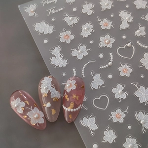3D embossed floral nail stickers with white flowers, butterflies and pearls decoration