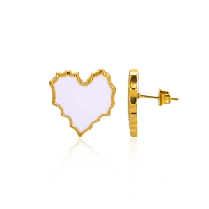 Detailed view of heart-shaped gold-framed earrings with white enamel and beaded texture