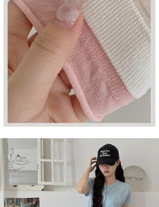 Close-up of pink and white striped knit texture on a soft cotton blend fabric