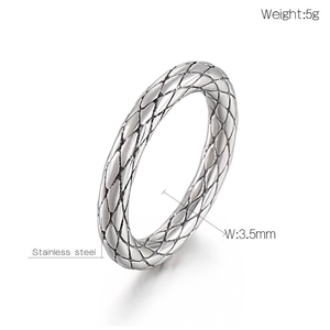 Silver stainless steel ring with diamond grid snake scale pattern in a minimalist style
