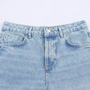 High waist light blue straight denim jeans with lace patchwork and metal button detail