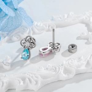 Kreative Silberohrstecker in Pilzform mit Tropfen-Zirkonia in Blau und Rosa