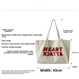 Detailed view of beige canvas tote bag dimensions 43x34x11cm with inner zipper pocket