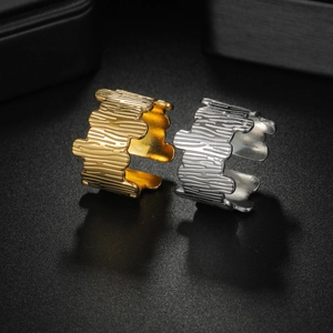 Fashionable gold and silver stainless steel rings with unique tree bark texture pattern