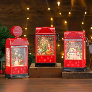 Luminous Christmas gas station decor with rotating snow, Santa and snowman figures