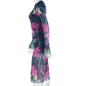 Detail of long sleeve slim fit mesh dress with floral print and side ruched texture