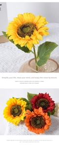 Detail of faux sunflower petals in yellow, red, and orange with realistic textures