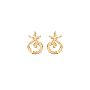 Close-up of golden starfish-shaped earrings with a polished spiral surface on white background