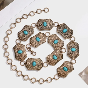 Bohemian style metal chain waist belt with turquoise inlays on a clean white background