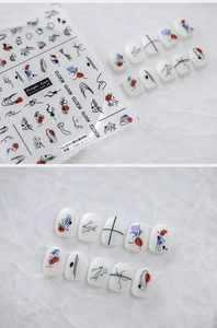 Detail of minimalist nail stickers TS-3033 with black lines and colorful geometric shapes