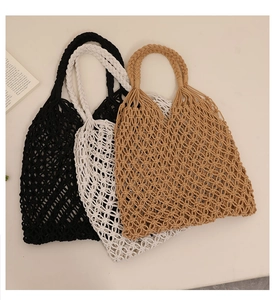 Detailed top view of handmade woven hollow out tote bags in black, white and khaki colors