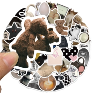 Minimalist black and white sticker set with teddy bear, cat and coffee icons for scrapbooking