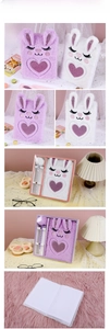 Detail of plush bunny A5 notebook with sequins and matching pom-pom pen in gift packaging