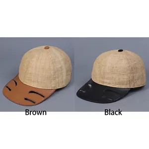 Raffia straw baseball cap with leather brim featuring cut-out detail in brown and black