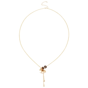 Gold rocking horse necklace with tiger eye stone and cubic zirconia on a white background