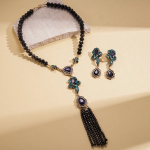 Vintage bohemian jewelry set with crystal teardrop necklace and matching earrings
