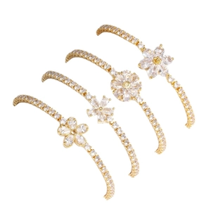 Bracelets à fleurs dorés ajustables avec pierres en zircon brillant en quatre modèles