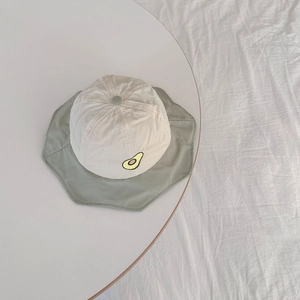 Detailed embroidery of a cartoon avocado on a breathable quick-dry kids bucket hat