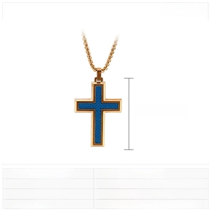Detail of gold cross necklace with blue resin inlay and specific 50x34mm measurements