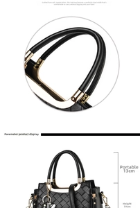 Detail view of black quilted PU tote bag with gold hardware, height 19cm and handle 13cm