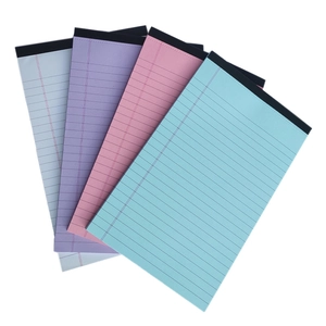 Set of four pastel colored American legal pads with ruled lines for office note-taking