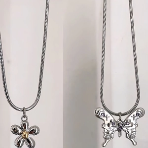 Y2K style flower and butterfly pendant necklaces with silver snake chain and purple gems