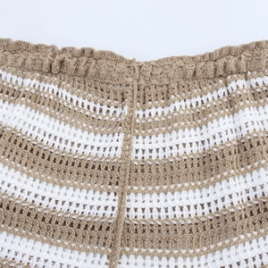 Cropped halter knit top and striped shorts set in khaki and white hollow knit fabric
