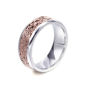 Minimalist two-tone stainless steel ring with rose gold braided texture on white background