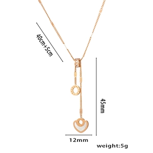 18K rose gold titanium necklace with Roman numerals, heart charm and white pearl inlay