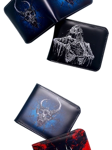 Close-up of gothic skull and grim reaper prints on vintage men's compact PU wallets
