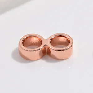 Macro shot of rose gold S925 silver double-loop connector for DIY jewelry making