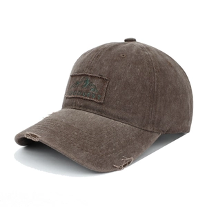 Distressed brown washed cotton baseball cap with embroidered mountain patch for outdoor wear